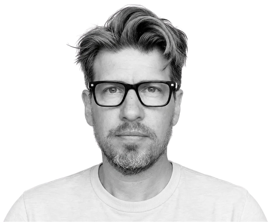 Olly Whitman – brand strategist, eyes redacted by an orange bar