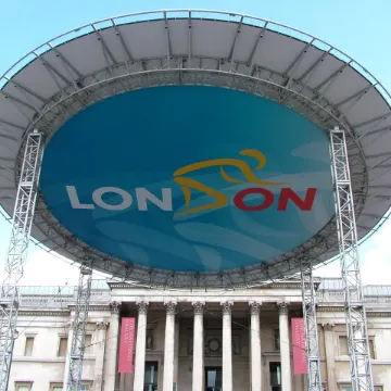 A giant oval screen reading “London” mounted in front of the National Gallery