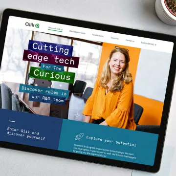 A tablet showing a Qlik careers page: “Cutting edge tech for the curious”